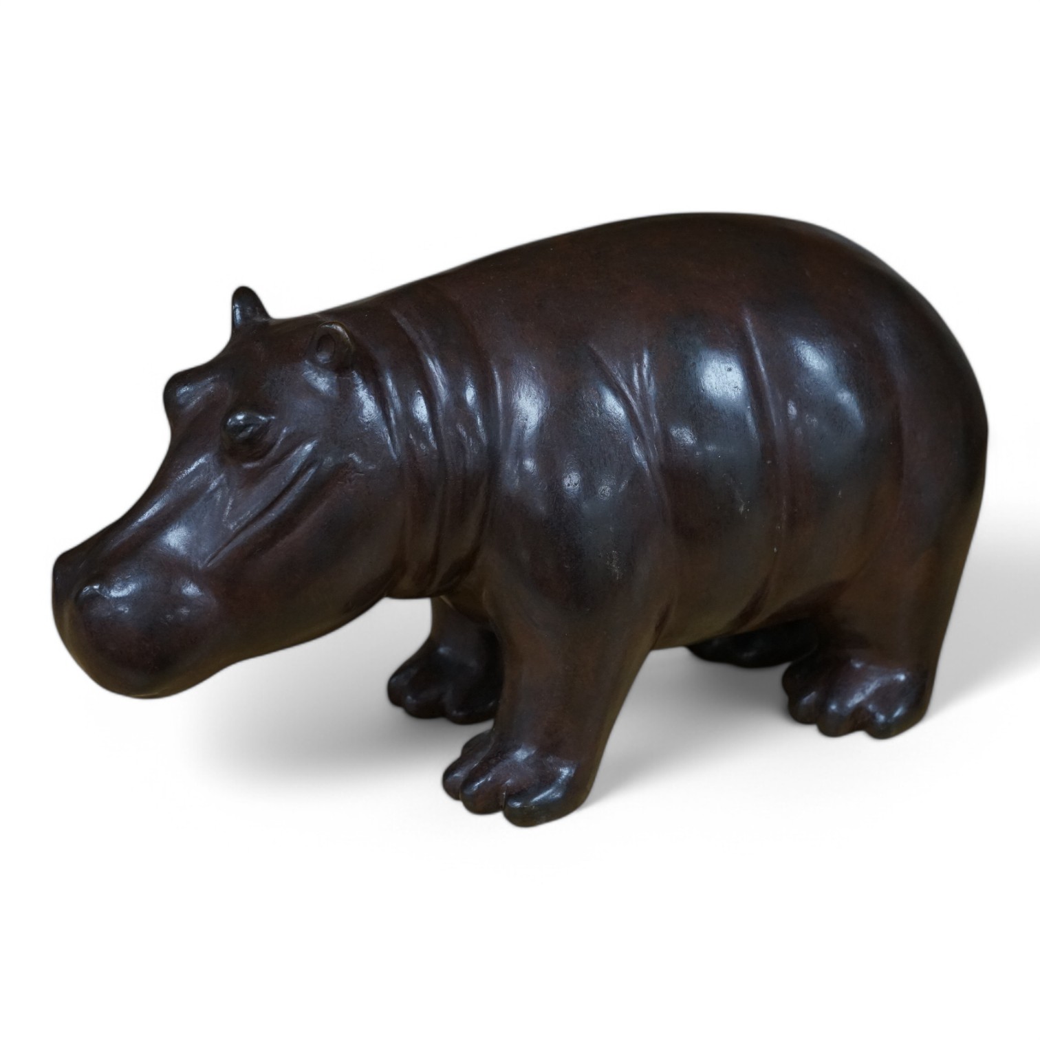 Anita Mandl (1996-2023), A cast bronze model of a hippopotamus, marked ‘A M’ limited edition 5/7’, 28cm long. Condition - good. Provenance - Harrison Zoological Museum, Bowerwood House in Sevenoaks.